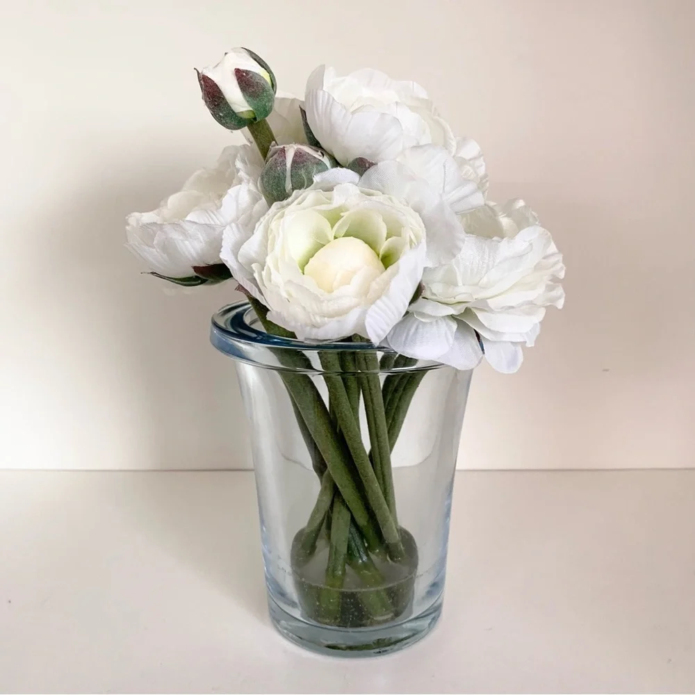 Thomas O’Brien Faux flowers in blue glass vase